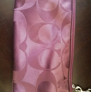 Coach small purple wristlet